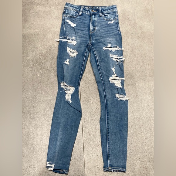 Blue American Eagle High Rise stretchy comfortable jeans. Size 0. - Picture 2 of 3